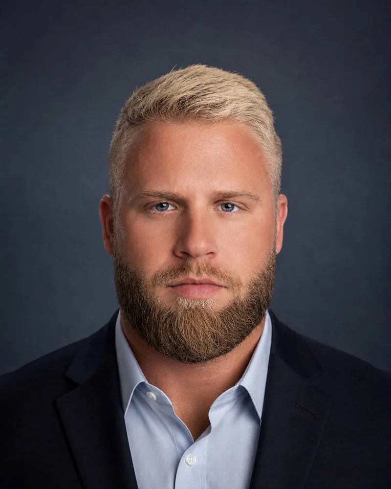 Official headshot of Tyk Sullivan, Tampa-based entrepreneur and founder of Plutus Capital and NUMEN